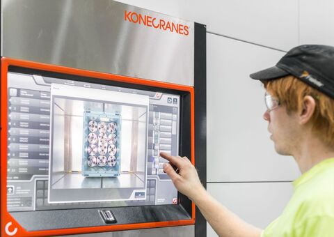 Warehouse worker inspecting package and item details from the Agilon UI.