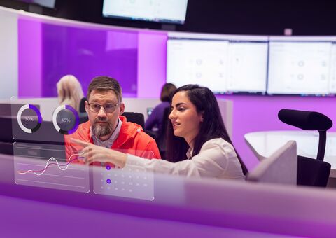 Cybersecurity employees with data