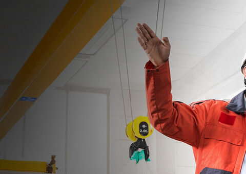 Men with overhead crane