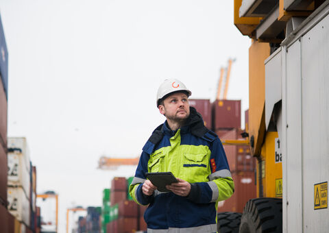 Ports employee with tablet
