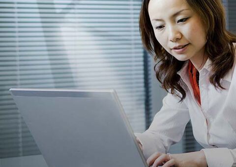 KC employee with laptop